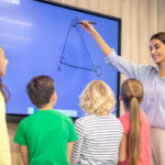 Woman Drawing Showing Triangle Blackboard Children (1) (1)