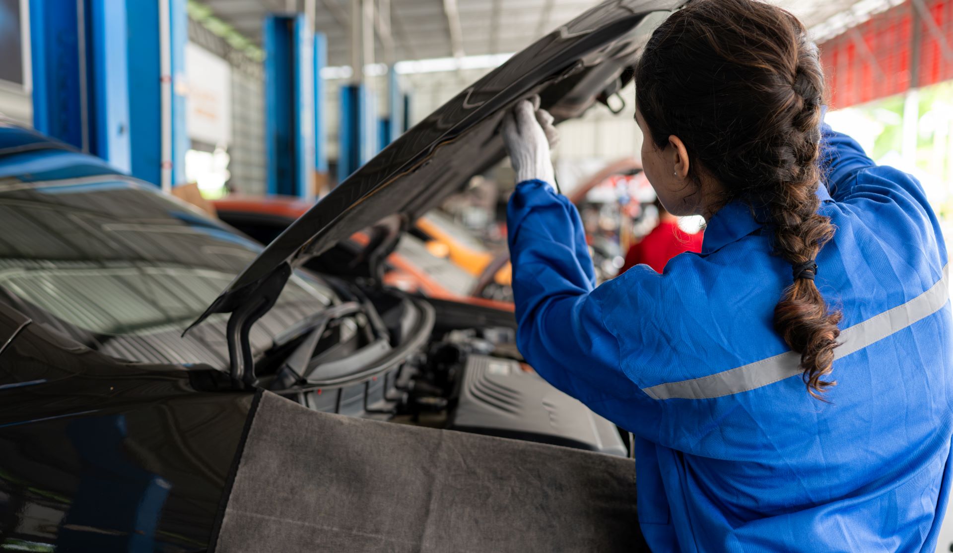 Car Mechanic Working In An Auto Repair Shop Inspe 2023 11 27 05 30 51 Utc (1)